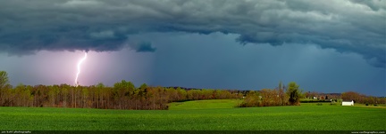 Bolt from the Blue -- A spring storm in the Piedmont of North Carolina lights up the darkened clouds with a spectacular display.
