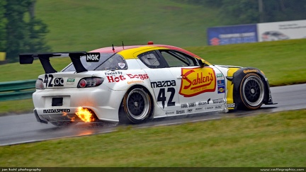 Fire and Water -- A flaming Mazda at VIR in the rain