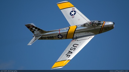 F-86F Sabre -- The beautiful shape of a 70 year old jet fighter soars over Winston Salem during an airshow