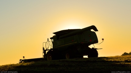 October Morning -- A combines is silhouetted in the early morning sun in western NC.