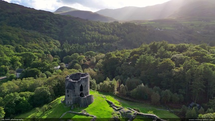 Late Afternoon at Dolbadarn Castle -- The afternoon sun shines down on Dolbadarn castle, mist rising from the peaks of Snowdonia.  
For details and history on Welsh castles, check out Jeff's Castles of Wales website (www.castlewales.com).