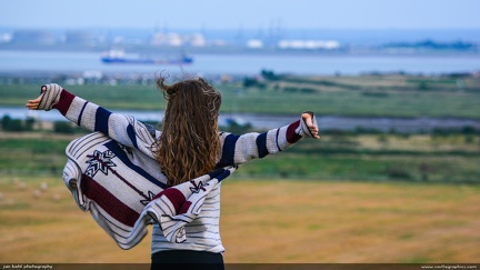 Overlooking the Sea -- Young woman enjoys the view from Hadleigh Castle overlooking ships coming up the Thames.